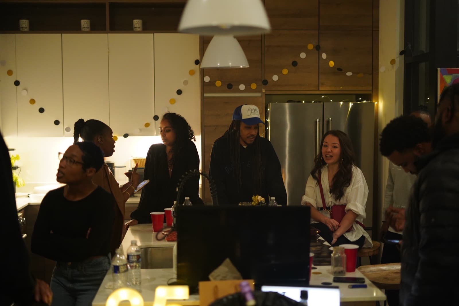 A gathering inside Avi8ted House